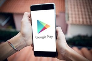Illustration of mobile apps with NFTs and digital assets as Google Play embraces blockchain technology