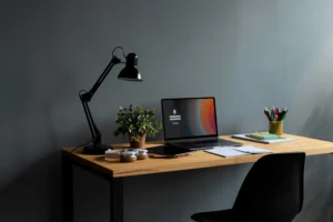 Home Page Template 20 Freelancer workspace setup with laptop, productivity tools, and mobile apps
