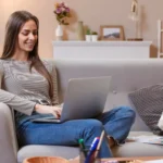 woman-working-from-comfortable-couch